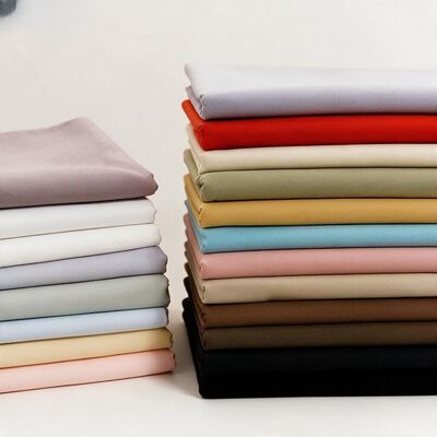 ผ้าไมโครไฟเบอร์พรีเมียม 140gsm ทนต่อรอยยับสูง หน้ากว้าง 150 ซม. สำหรับเสื้อเชิ้ตหรู